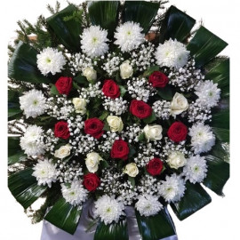 Large funeral wreath with roses and chrysanthemums