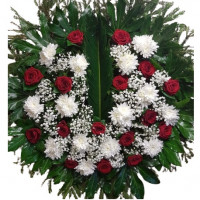 Large funeral wreath with red roses and white chrysanthemums